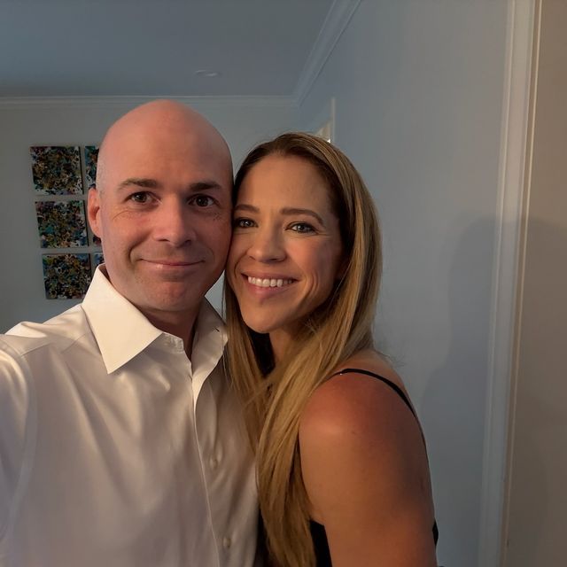 Grayscale photo of Jonathan and his wife